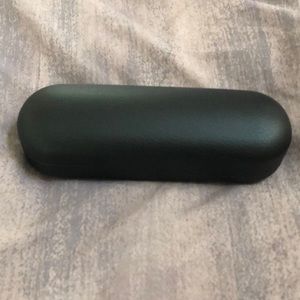 Oakley eyeglass case. Black leatherette with Oakley lower right, O logo inside.